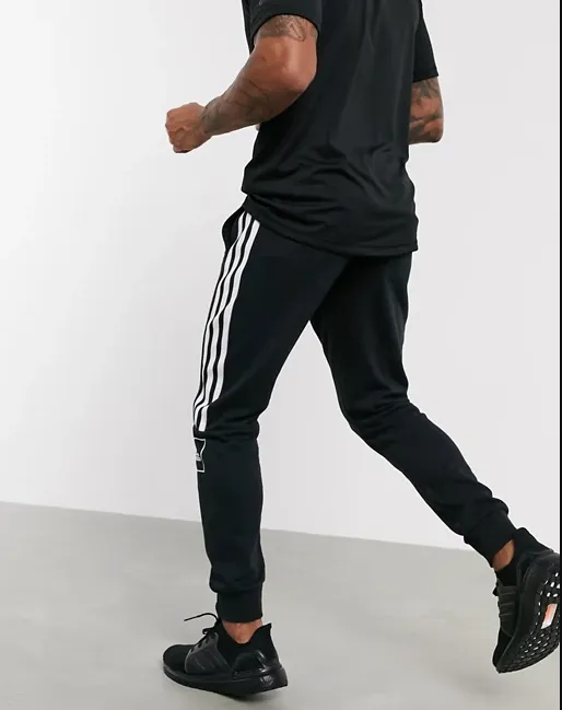 adidas skinny 3 stripe joggers in black